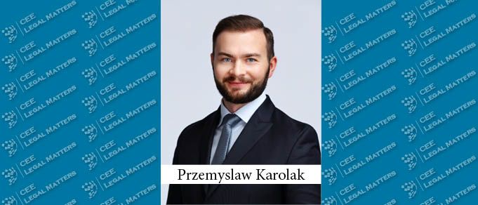 Przemyslaw Karolak Moves from Aon to Kondracki Celej